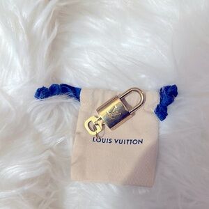 Louis Vuitton Gold Padlock luxury item
